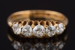 An 18ct gold and diamond five stone ring: with graduated,