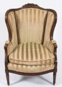A French carved beechwood armchair:,