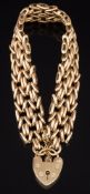 A 9ct gold bracelet: with padlock clasp and safety chain, 23gms gross weight.