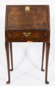 A late 19th Century walnut veneer and chequer inlaid bureau of small size:,