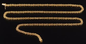 An 18ct gold Byzantine neck chain of twisted rope design: with box snap clasp and two safety