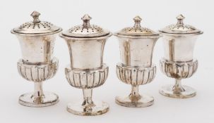 A set of four Chinese silver export pepper pots and cover, maker KHC possibly Khechong, Canton,