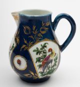 A Worcester sparrow beak milk jug: painted with exotic birds and insects in fan and circular shaped