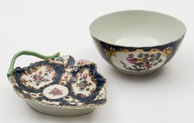 A Worcester blue ground bowl and a scale blue leaf-shaped dish: the bowl painted with four panels