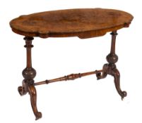 A Victorian walnut and inlaid oval-shaped centre table:,