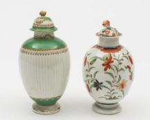 Two Worcester tea canisters and covers: one of plain ovoid form with flower finial,