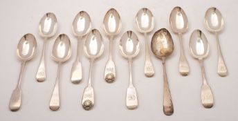 A collection of twelve assorted pattern dessert spoons, various makers and dates: most initialled,