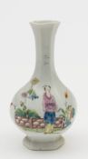 An early Worcester small hexagonal vase: painted in the famille rose palette with a Chinese figure