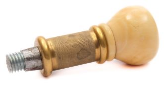 An ivory and mother of pearl inlaid walking cane handle: with gilt brass engine turned collar, 7.
