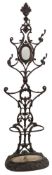 A cast iron hat and umbrella stand of Coalbrookdale type by Corneau Brothers:,