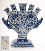 A Dutch blue and white delftware tulip vase: the heart shaped body with five nozzles and crouching