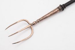 A Georgian III silver and turned mahogany toasting fork, maker TH, London,