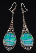 A pair of Arts and Crafts style opal doublet mounted drop earrings: each of tapering foliate design
