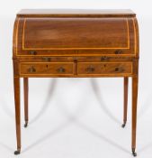 An early 19th Century mahogany, satinwood banded and inlaid cylinder fronted bureau:,