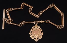 A 9ct gold watch chain: with circular and elongated links with gilt metal 'T' bar and attached 9ct