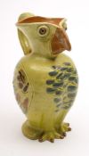 A William Baron (Barnstaple) pottery 'Puffin' jug: with applied ribbed strap handle,