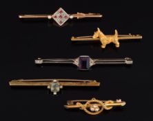 Five various bar brooches: to include a 'Scottie dog' bar brooch,