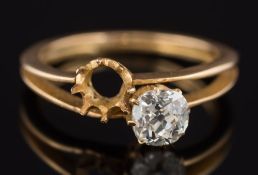 A diamond two stone ring with one vacant setting: with cushion shaped,