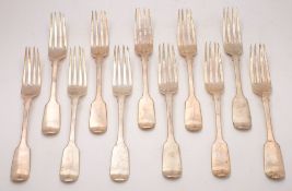 A set of eleven Victorian silver Fiddle pattern table forks, maker John Samuel Hunt, London,