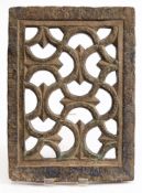 A Middle Eastern carved and pierced stone jali panel: carved with interlocking foliate scrollwork,