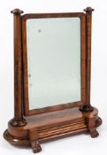 A Victorian mahogany swing frame toilet mirror:, with a rectangular plate and turned uprights,
