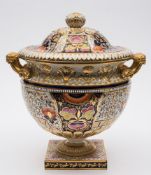 A large Derby Japan pattern two-handled pedestal vase and cover: with bud finial and vine branch