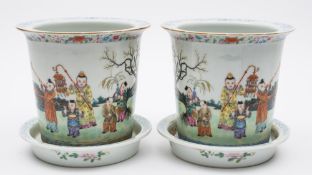 A pair of Chinese porcelain jardinieres and matched stands: The jardinieres of flaring cylindrical