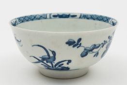 A small Worcester blue and white bowl: painted with 'The Warbler' pattern with a bird perched