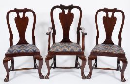 A set of eight mahogany dining chairs in the Queen Anne taste:,