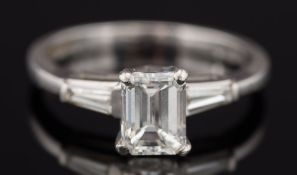 A platinum and emerald-cut diamond single-stone ring: with emerald-cut diamond approximately 6.