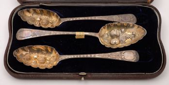 A pair of George III and later decorated berry spoons, maker Solomon Hougham, London,