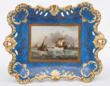 A mid 19th century English porcelain tray: enamelled with a gilt bordered panel of a maritime scene