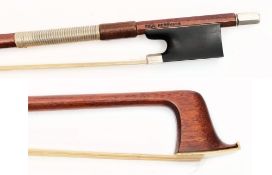 A violin bow by Paul Hermman: with ebony and mother-of-pearl inlaid frog, stamped Paul Hermann,