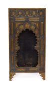 A Persian ornate gilt metal photograph stand: of rectangular outline,