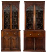 Two matching early 19th Century mahogany secretaire bookcases:,