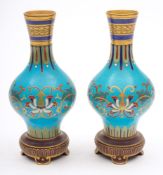 A pair of Minton Aesthetic Movement faux cloisonne porcelain vases: probably after a design by Dr.