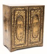 A 19th century Cantonese export lacquer table top cabinet: of rectangular outline,
