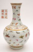 A Chinese famille rose 'One Hundred Butterflies' bottle vase: painted with brightly coloured
