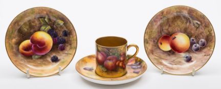 A small group of Royal Worcester fruit painted porcelain: comprising two shallow circular dishes