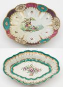 A Worcester fluted oval dish and a similar dish: the first painted with fancy birds in a landscape