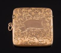 A 9ct gold foliate engraved vesta case: with Birmingham hallmarks, 46mm across,