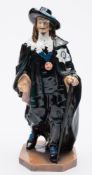 A large Royal Doulton figure of King Charles HN404: designed by C.J.Noke and H.