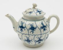 A Worcester blue and white teapot and cover: of globular form with flower finial,