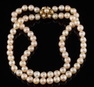 A graduated baroque cultured pearl two-string necklace: with a 9ct gold and cultured pearl mounted