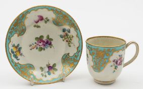 A Worcester coffee cup and saucer: painted in the workshops of James Giles with sprays of flowers