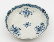 A Worcester blue and white junket dish: moulded with cartouches amongst basket weave,