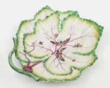 A Worcester leaf dish: moulded with overlapping vine leaves and applied stalk handle,