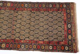 A Feraghan runner:, the shaded field with an all over geometric boteh design,