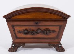 By Mack, Williams & Gibton, Dublin - A William IV carved mahogany domed cellarette:,