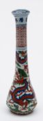 A Chinese wucai porcelain calligraphy brush handle: of slender elongate form decorated in under